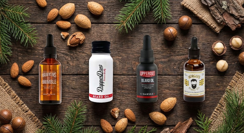 Флакони з темного скла з натуральною олією для бороди BeardBro на фоні мигдалю, макадамії та хвої